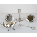 A silver selection to include - a pair of small circular hallmarked silver easel-style photograph