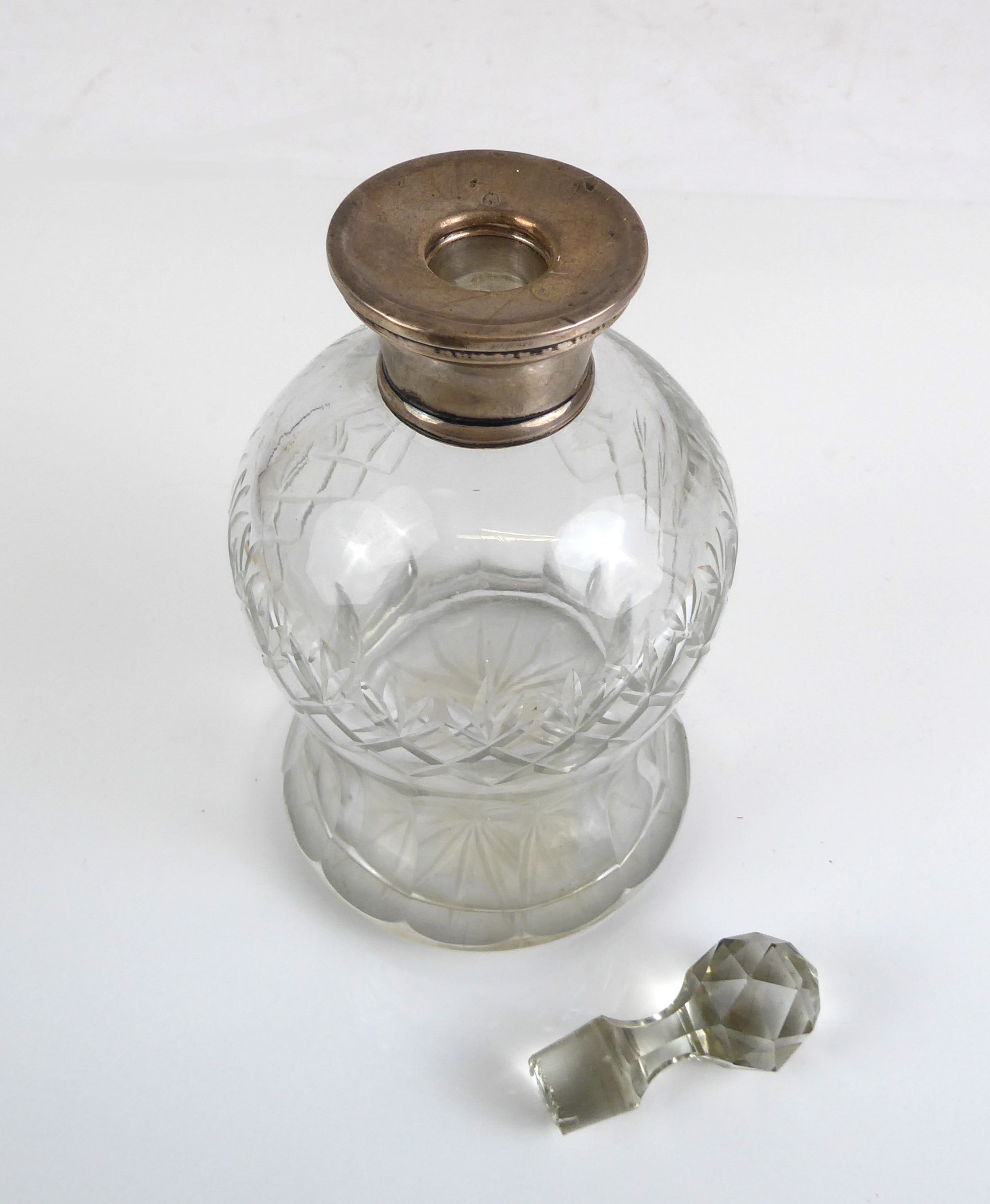 An early 20th century cut-glass ovoid decanter with silver-mounted collar and (probably later) - Image 3 of 3