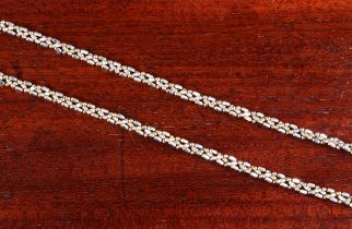 A 9ct two-colour gold fancy link necklace - 48.8cm. long, weight 11.6g.