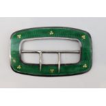 A very fine hallmarked silver and green enamel buckle: decorated with six gold shamrocks against a