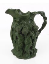 A large Minton dark-green moulded stoneware Silenus jug - 19th century, moulded with the figures