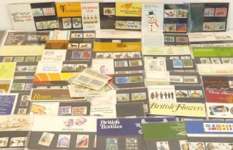 A good quantity of mint UK stamps comprising: 39 British Post Office Mint Stamps sleeved sets (