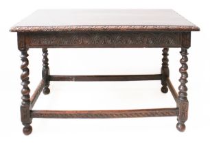 A late 17th century style oak centre table (with some period elements): the moulded top carved to