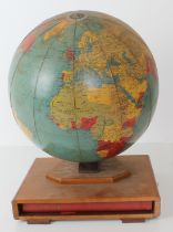 A library globe by Georama Ltd (Specialists in illuminated globes): the globe sited on a mahogany