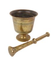 An antique bronze pestle and mortar - probably Indian, 18th / 19th century, of urn form, decorated