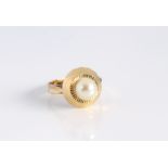 A vintage yellow gold and single pearl ring - overseas hallmarks to outside of shank, tests as