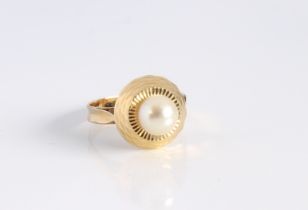 A vintage yellow gold and single pearl ring - overseas hallmarks to outside of shank, tests as