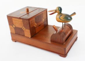 A 1930s novelty marquetry, parquetry and carved wooden mechanical cigarette box - the box with