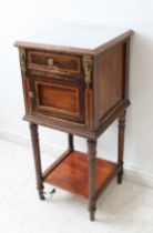 An early 20th century white-marble-topped and gilt-metal-mounted French bedside cabinet: single