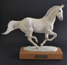 A bone china model of Desert Orchid by Albany Fine China Co. - modelled by Lorne McKean, printed