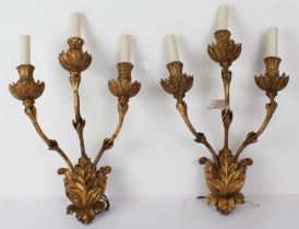 A pair of antique giltwood three-branch wall lights or appliques - 19th century, the foliate wall