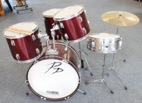 A Performance Percussion drum kit to include bass drum, snare drums, timpani cymbals and a