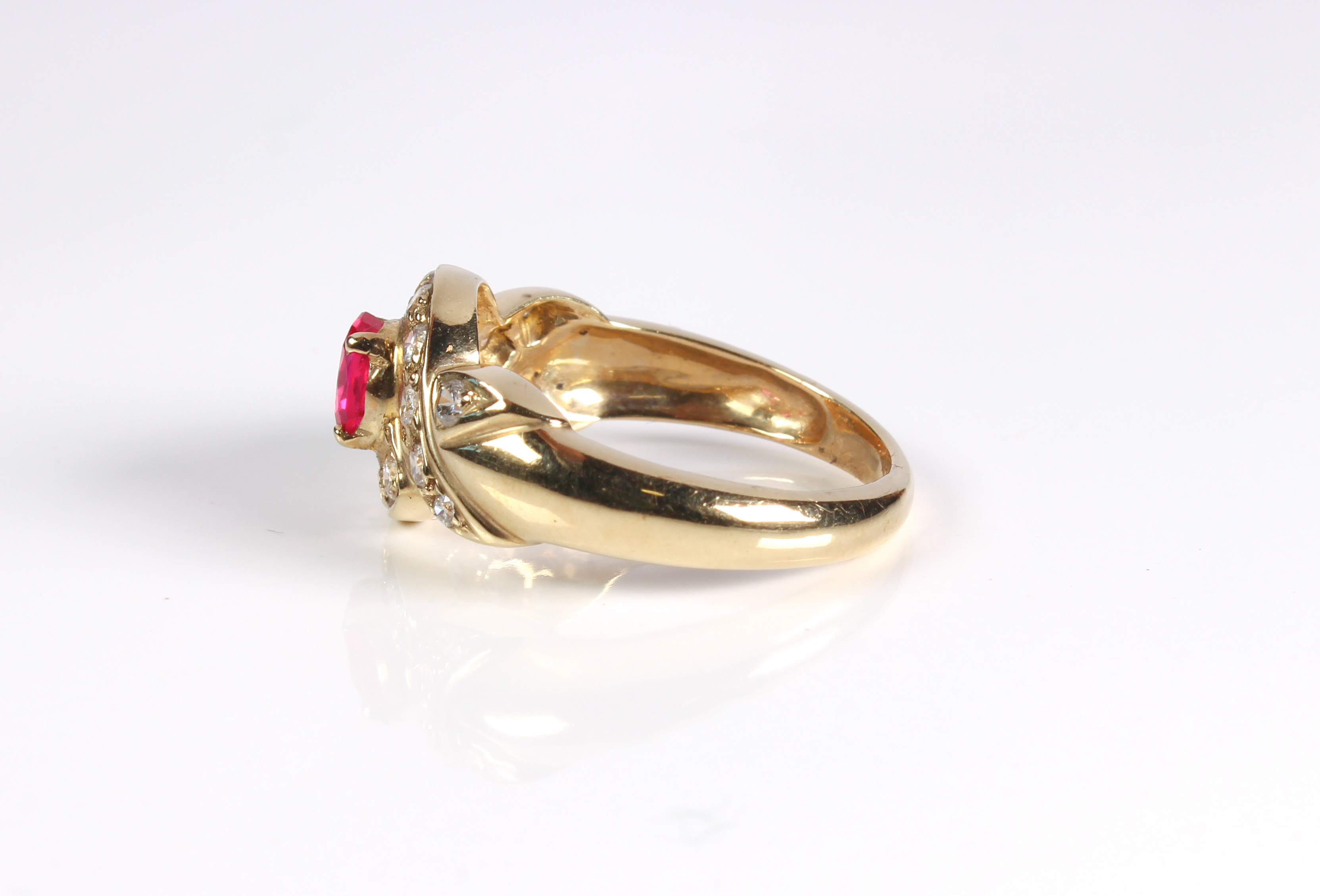 A 9ct yellow gold, pink and clear stone cluster ring - Sheffield hallmarks, with cross over setting, - Image 2 of 4