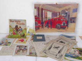 A 1930s-50s teacher's folio case containing a collection of printed primary school teaching aids: