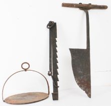 A 19th century iron inglenook fireplace pot hanger and griddle - together with an antique wrought