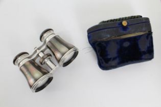 A pair of French aluminium and mother of pearl lightweight opera glasses - 1920s, in the original