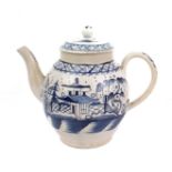 A late 18th century English pearlware hand-painted teapot with blue and white floral design (with