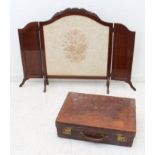 Two pieces: 1. A mahogany folding fire-screen - with carved top and floral decorated material centre