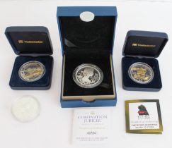 Three cased sterling silver commemorative coins and one other: 1. Royal Mint - 2012 diamond