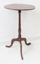 A George III period/early 19th century circular walnut tilt-top occasional table of slender