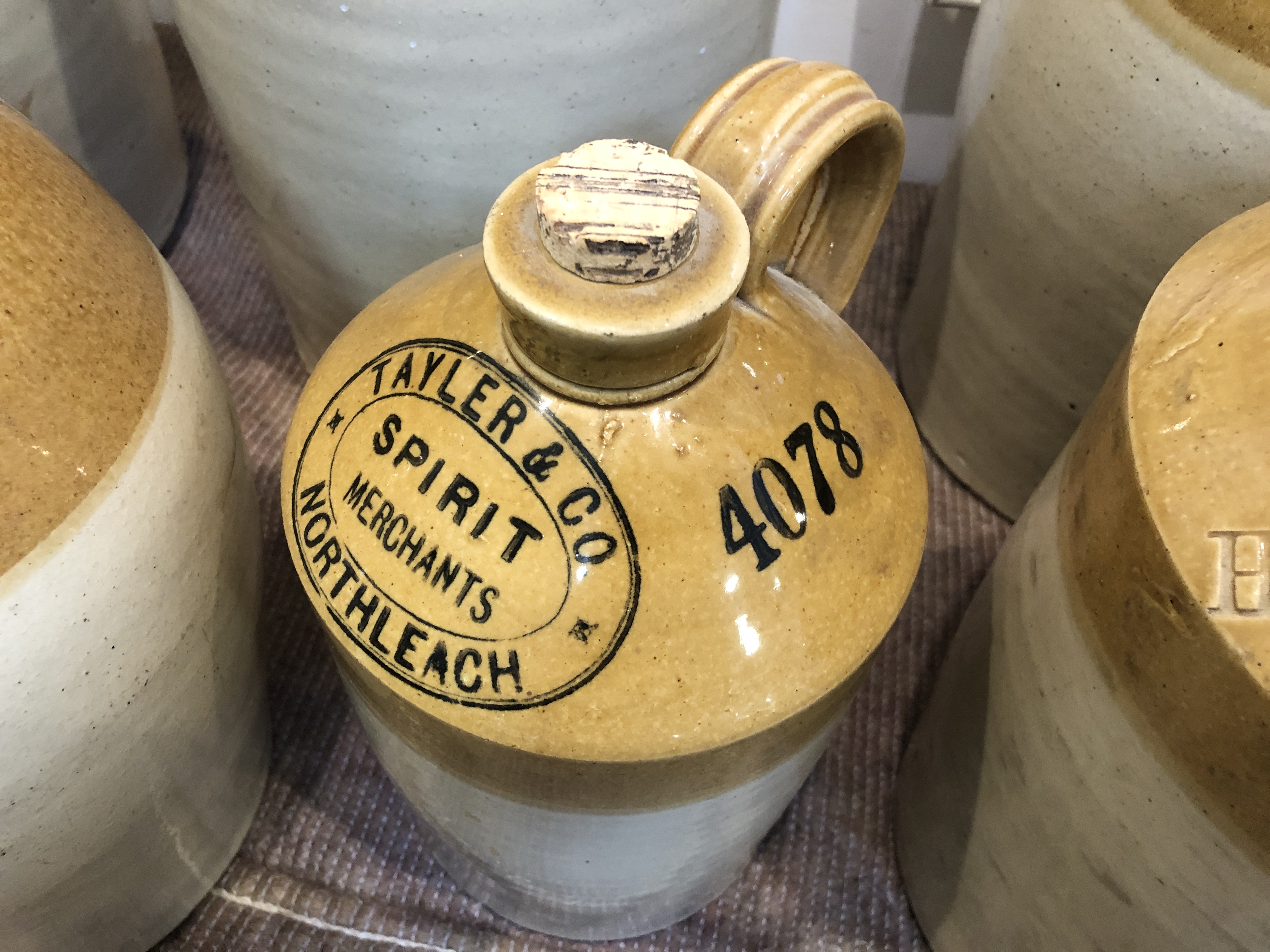 Fourteen late 19th and early 20th century jars and flagons (some with damage) to include: 'Dobell - Image 10 of 26