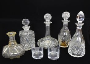 Four cut glass decanters, plus a Victorian lobed decanter (lacks stopper) and two House of Commons