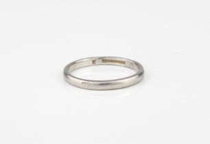 A platinum wedding band - marked 'PLATINUM', size N.