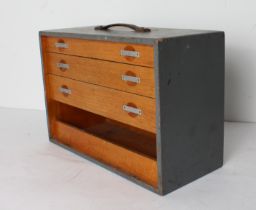 A painted tool chest with three full-width graduated oak drawers and compartment space below (LWH