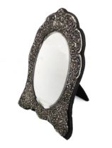 A silver easel-style mirror, assayed Birmingham 1909.