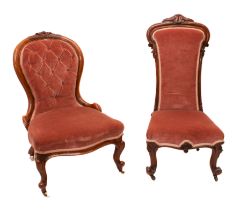 A Victorian carved walnut button-back lady's chair, the spoon back with foiiate cresting and short