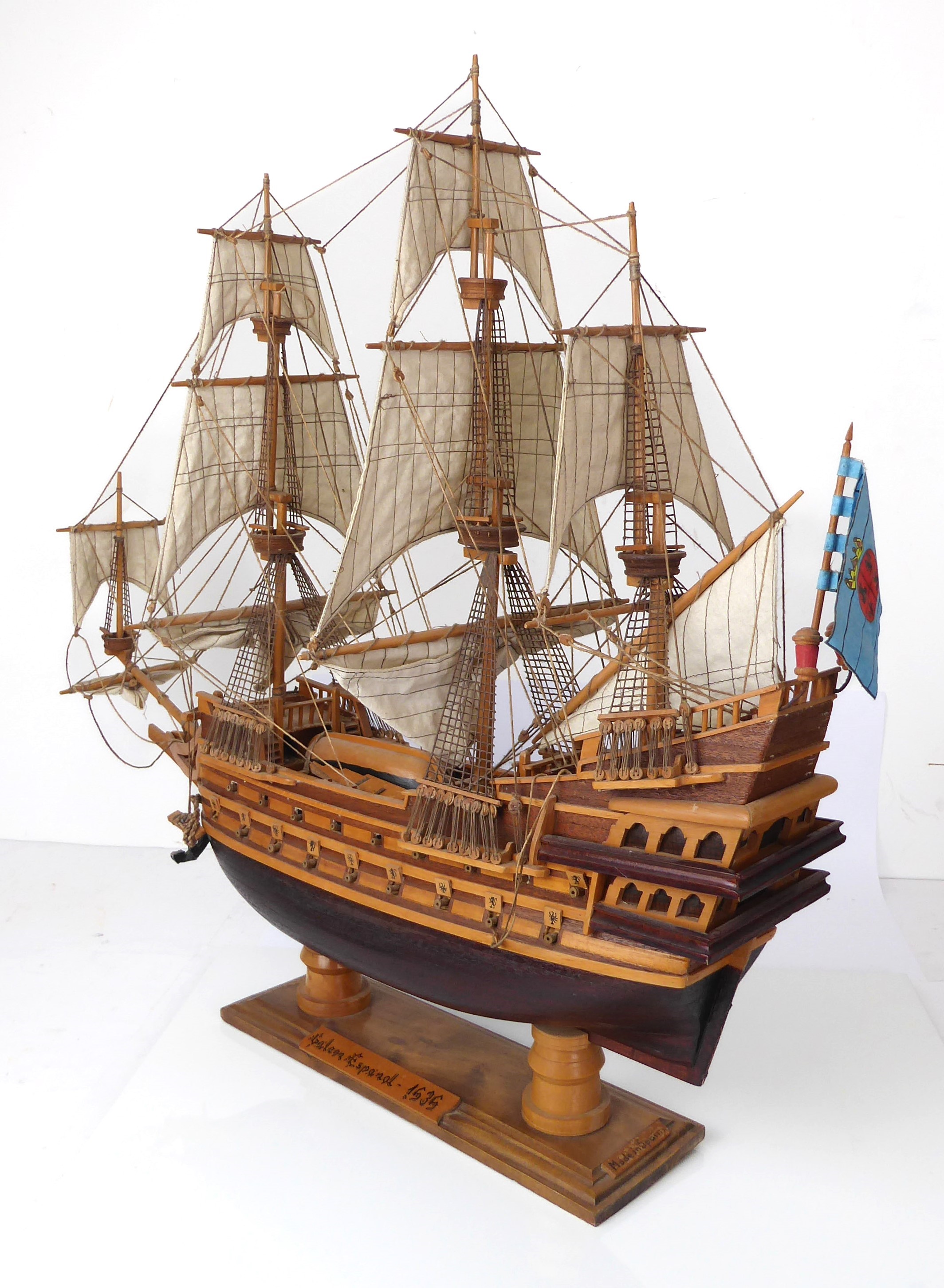A handmade wooden model of a 19th century Spanish galleon - Spanish, late 20th century, on a