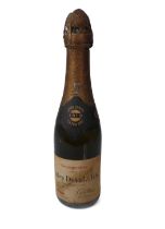 A half bottle of Jules Duval & Fils Duval Leroy Vertus 1919 Vintage Champagne - level low