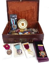 A collection of silver, silver gilt, gilt metal and enamel Masonic jewels - including jewels for the