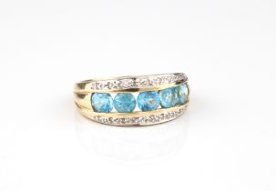 A 9ct white and yellow gold, topaz and diamond three row ring - hallmarked Birmingham 2000, with a