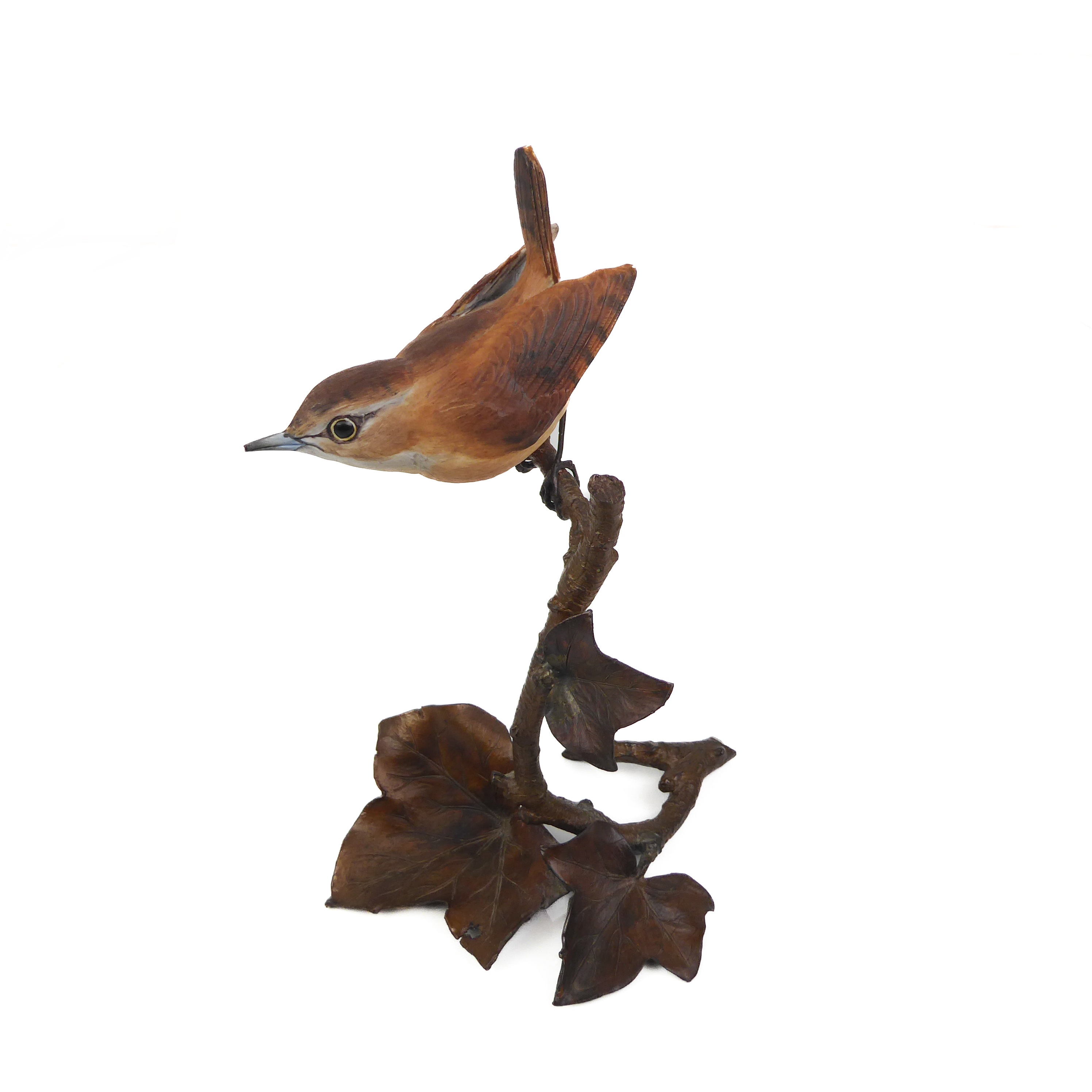 A 20th century cold painted bronze model of a wren setting upon a branch.