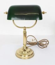 An antique style brass and green glass library lamp - the adjustable dark green cased shade on a