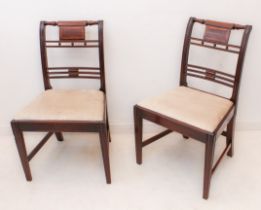 A pair of Regency inlaid mahogany chairs - with turned top rail and bar back with inlaid banded