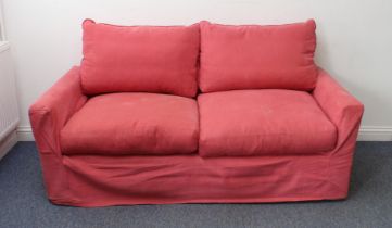 A Loaf double sofa bed - upholstered in dusky pink with removable covers, the mattress unused and in