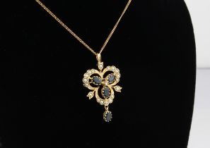 A vintage 9ct yellow gold, sapphire, seed pearl and diamond pendant - Sheffield hallmarks, 1970s-