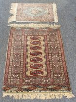 Two small rugs (95 x 62 cm and 53 x 47 cm)