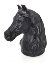 A cast iron bust of a horse's head