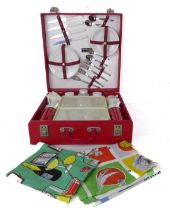 A 1960s Sirram picnic set for four, in the original red faux-leather case - with two red and gilt