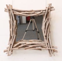 A modern rustic twig frame mirror: modern, the square plate within a frame of twigs painted in