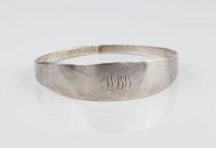 A Victorian silver bangle - hallmarked London 1860, plain form with engraved monogram, internal