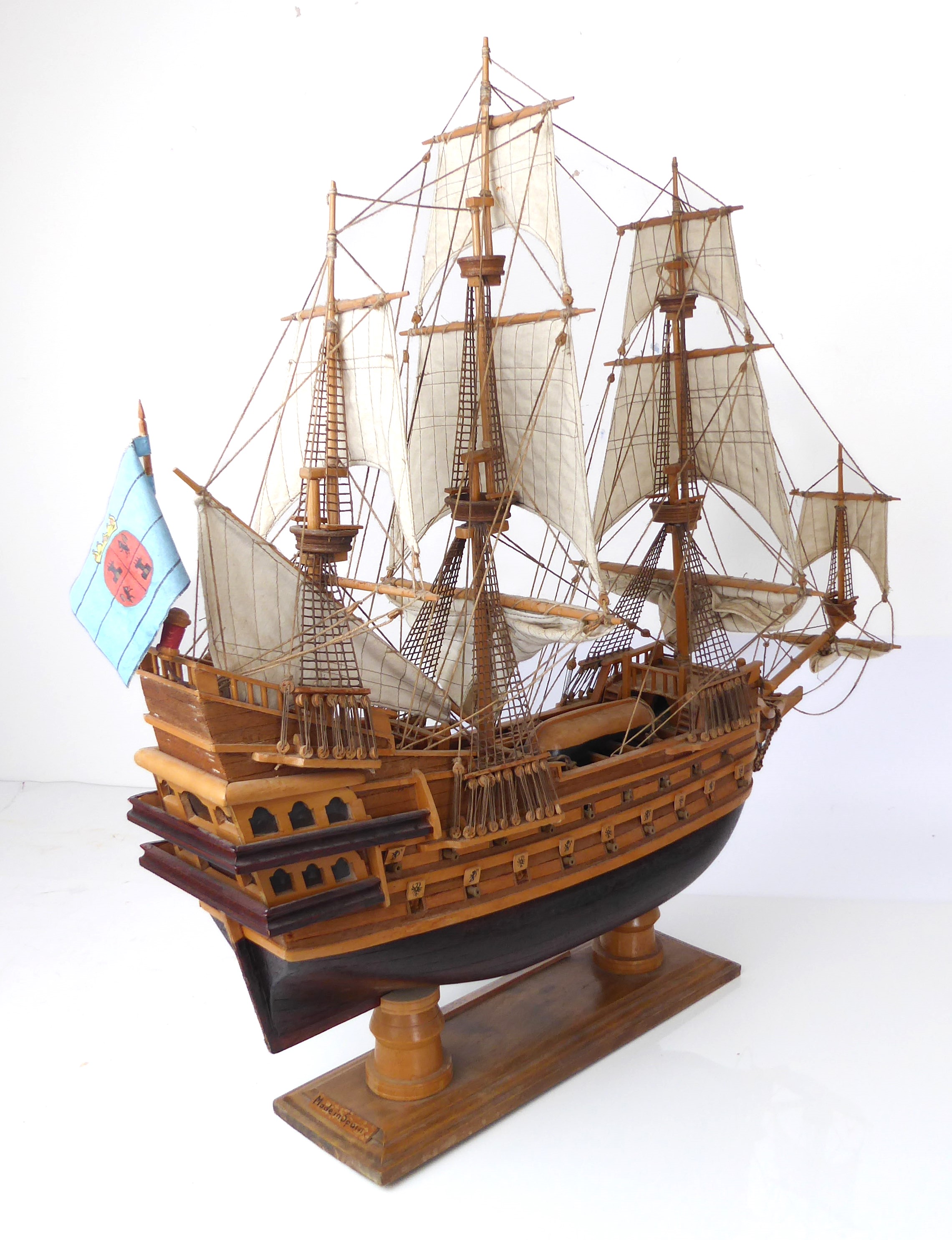 A handmade wooden model of a 19th century Spanish galleon - Spanish, late 20th century, on a - Image 2 of 2