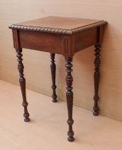 A small 1920s Georgian style mahogany occasional table: the rectangular top with gadrooned edge,