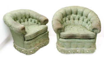 A pair of early 20th century button-back tub chairs, later green-damask tasselled upholstery (78 x