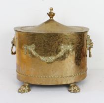 A Regency Adams-style oval brass coal box