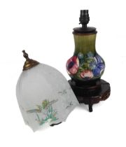 A decorative early 20th century Moorcroft vase now as a lamp base with associated electrical