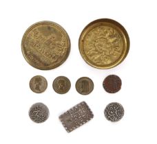 A brass sovereign case and its contents. The lid of the case embossed with Windsor Castle and the